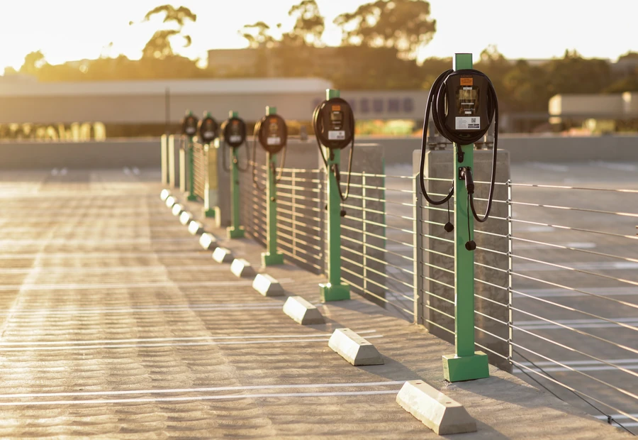 EV charging stations beside parking spaces