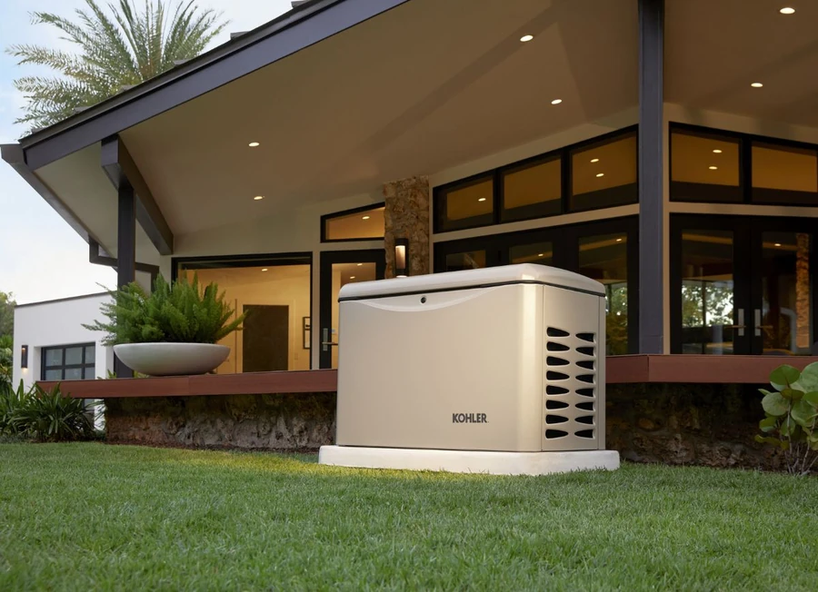 Standby generator beside a building