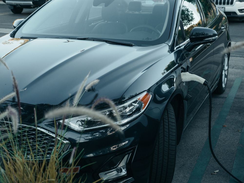 Electric vehicle connected to a charging station