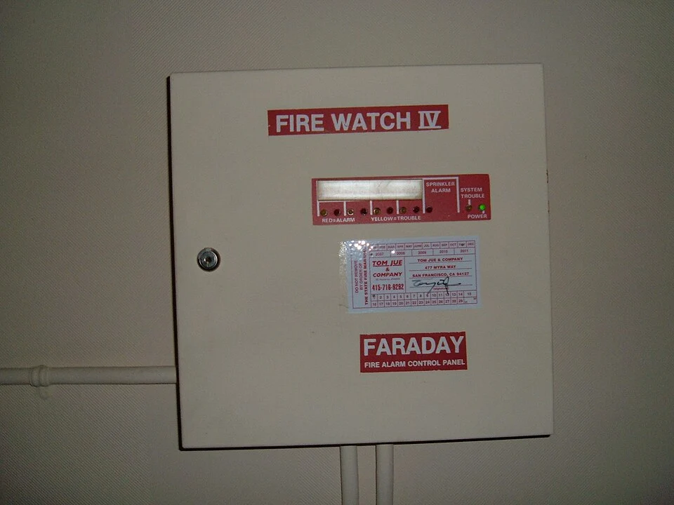 Faraday Fire Watch IV commercial fire-alarm control panel in a San Francisco office building.