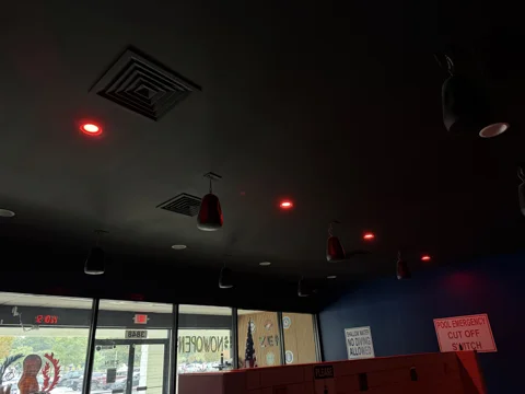 Lighting across the room. Another view of the ceiling and accent lighting in a commercial interior.