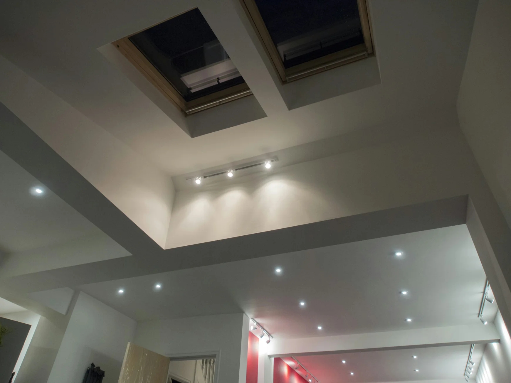 Skylights and recessed lighting in a modern ceiling — stock photograph