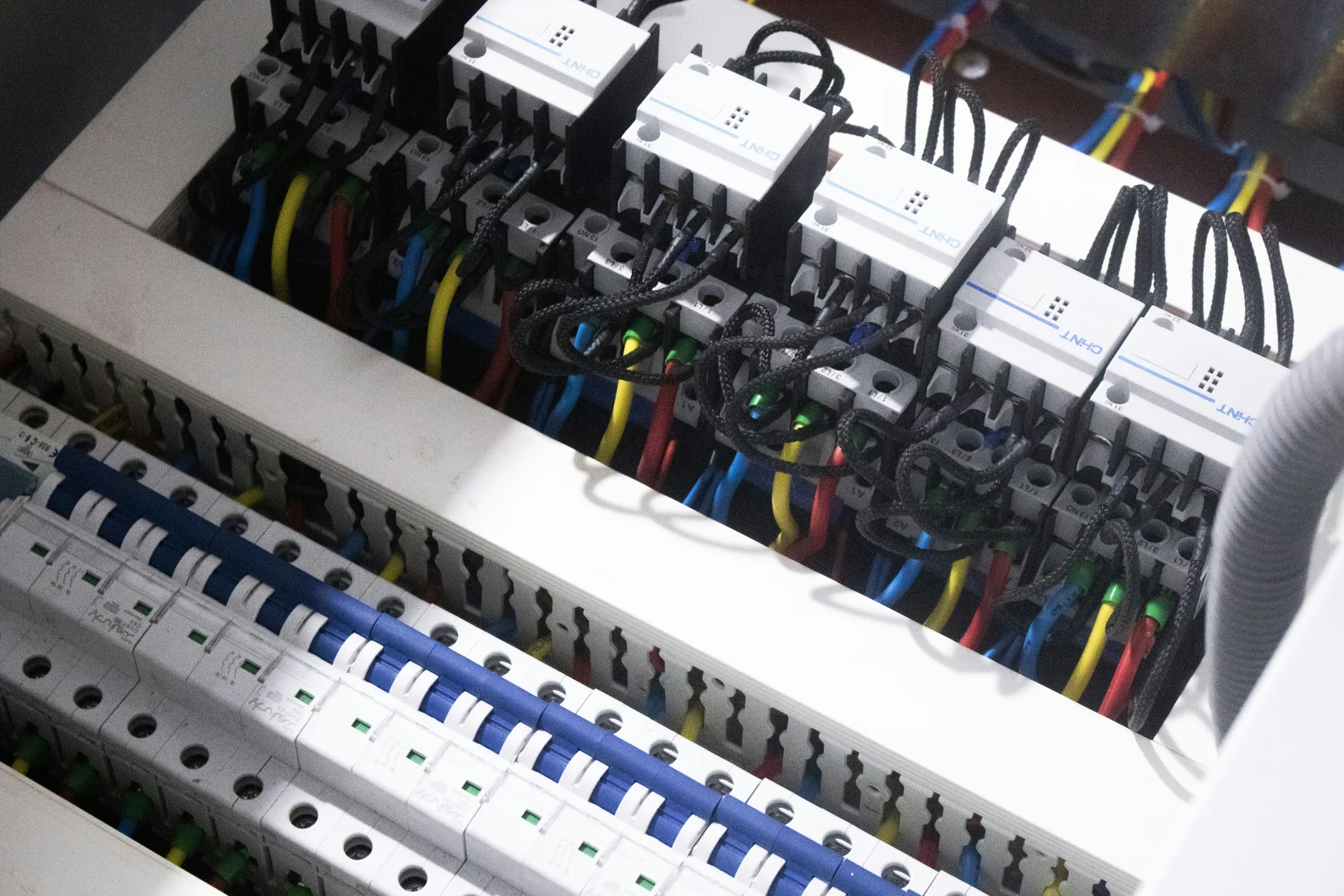 a bunch of wires are plugged into a switch box — stock photograph